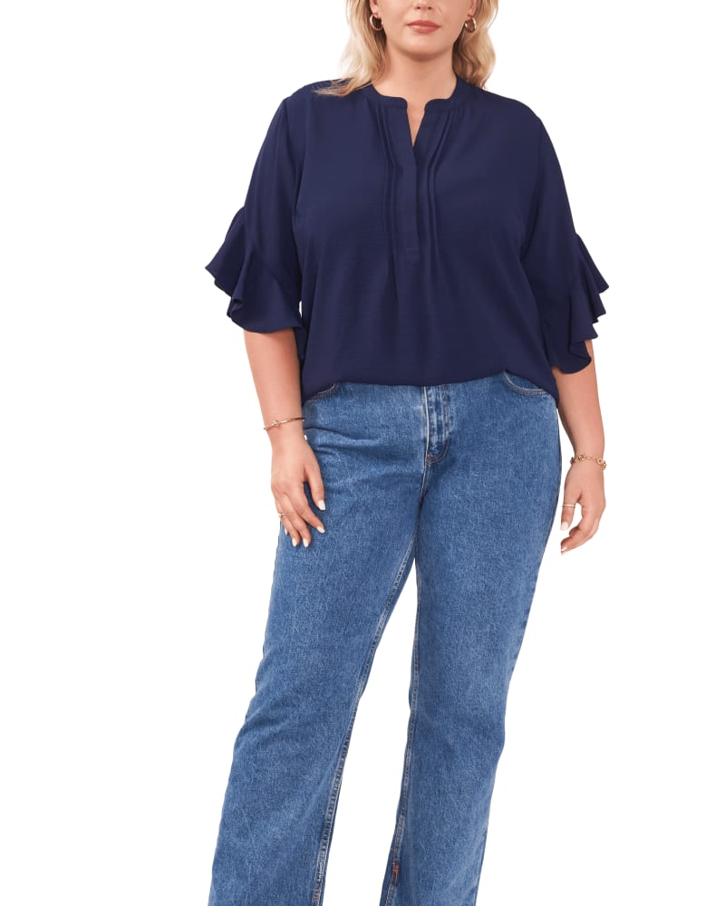 Front of a model wearing a size 1X Aubrey Ruffle Sleeve Blouse in CLASSIC NAVY by Vince Camuto. | dia_product_style_image_id:261318